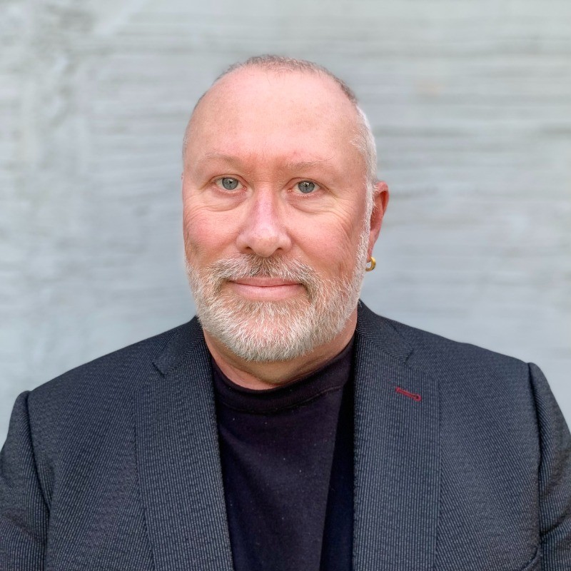 Portrait of Dr. James R. Quick, Managing Director, Professional Services at ACE IT Solutions